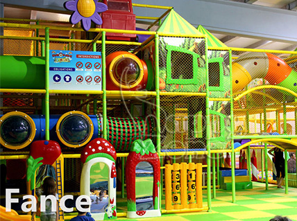 An indoor playground with a mysterious forest theme